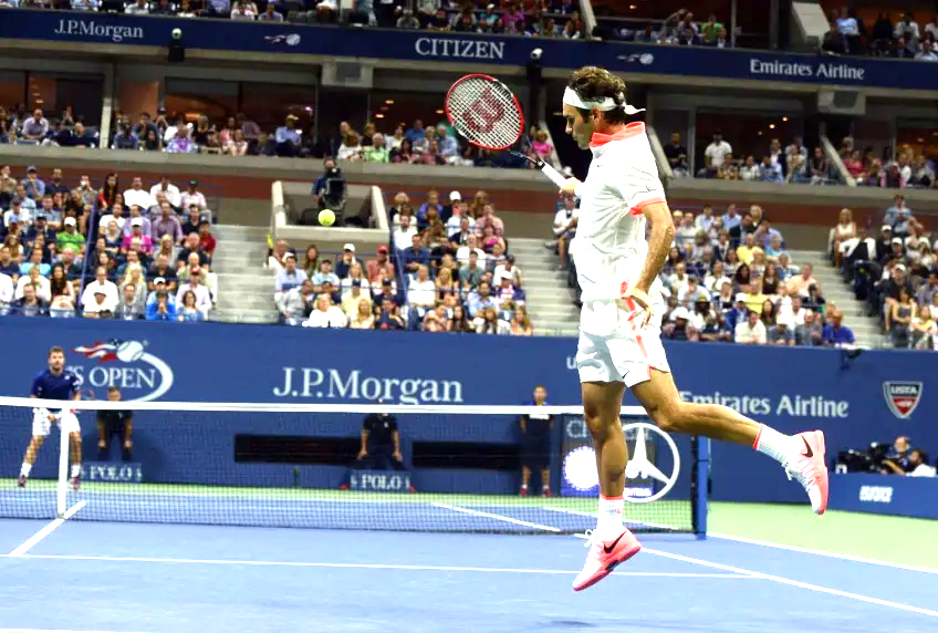 Roger Federer is defended by Pat Cash after John McEnroe had criticized his SABR shot.